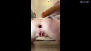 The dildo is really hard to get into my tight butt right now